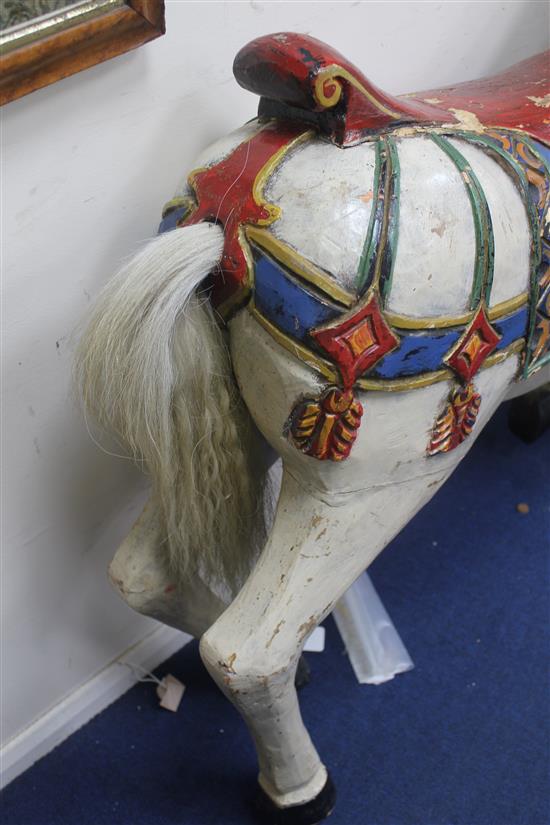 A carved and painted carousel horse, attributed to the Philadelphia Toboggan Company, 3ft 8in.